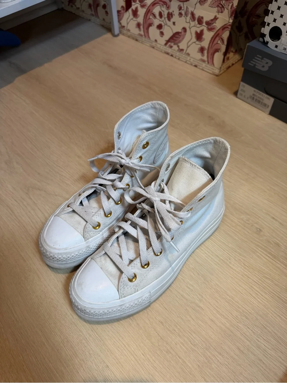 Converse White High-Top Sneakers with Gold Eyelets